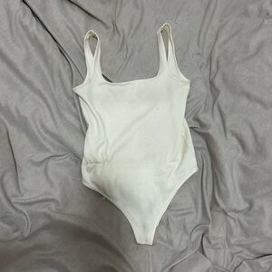 Skims White Bodysuit with Scoop Neckline and High-Cut Legs